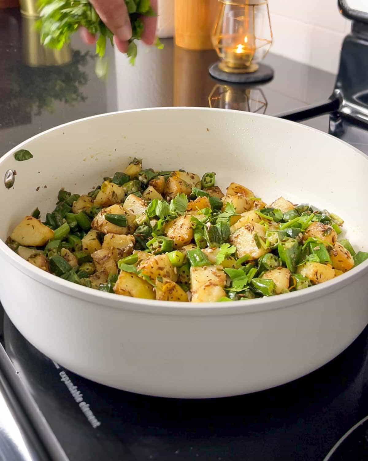bhindi aloo topped with chopped cilantro