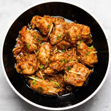chicken karahi served on a plate