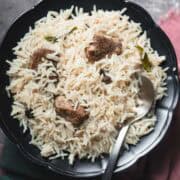 beef pulao served on a plate
