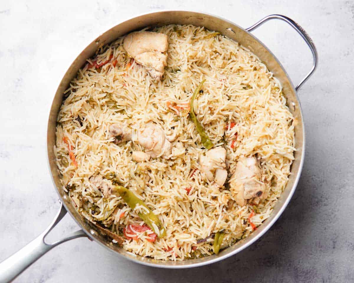 delicious looking chicken pulao in a pan