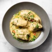 white chicken karahi served in a deep plate