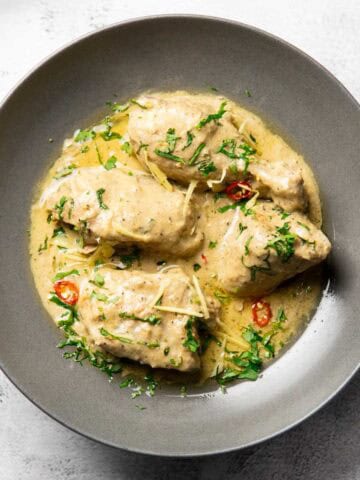 white chicken karahi served in a deep plate