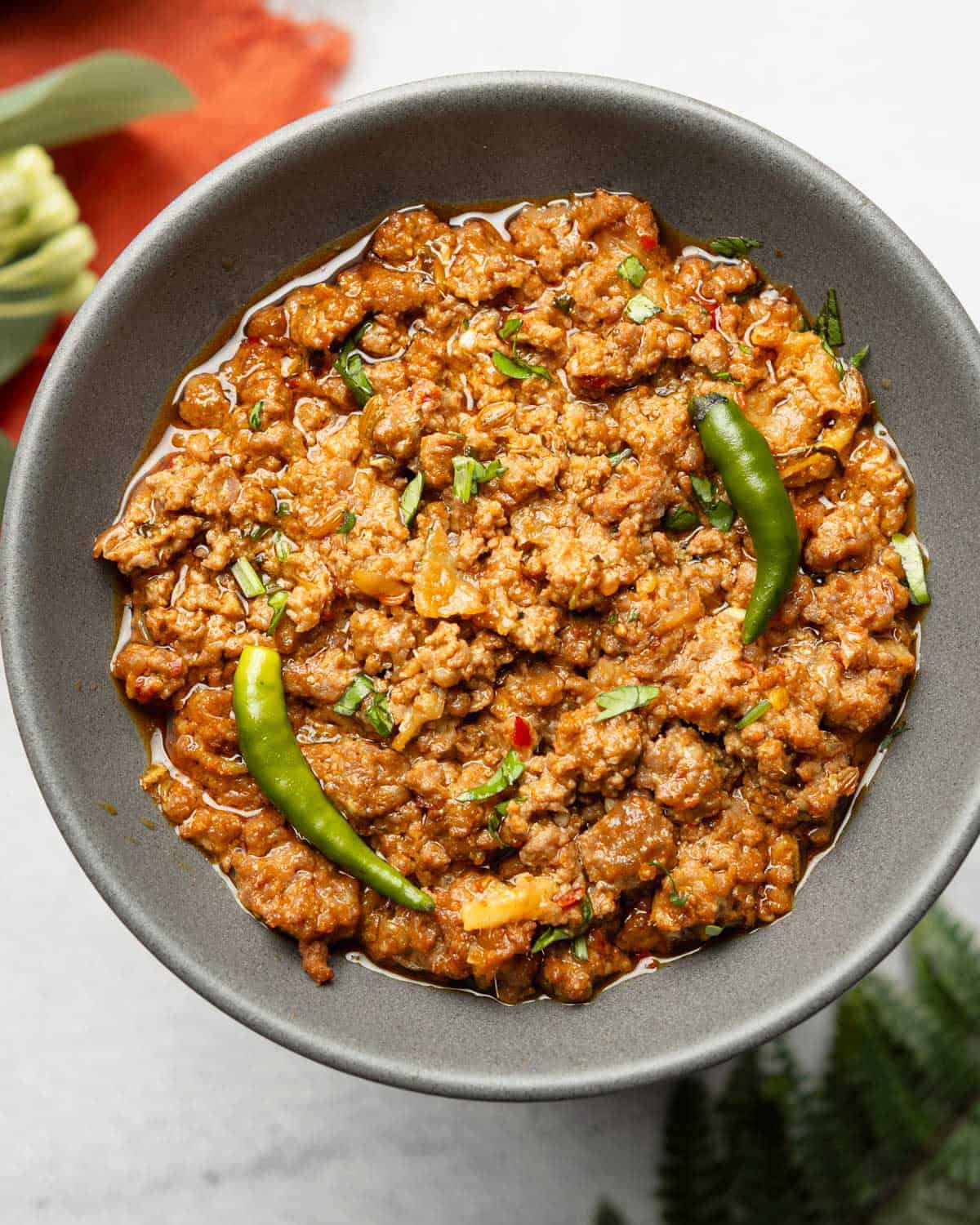 achari keema on a gray plate