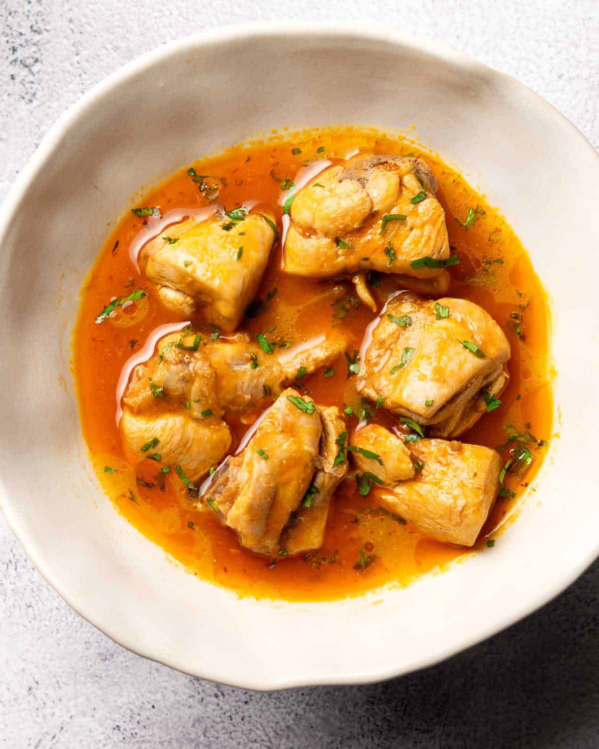 chicken shorba served in a low bowl