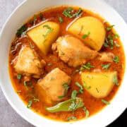 chicken aloo salan served in a deep bowl