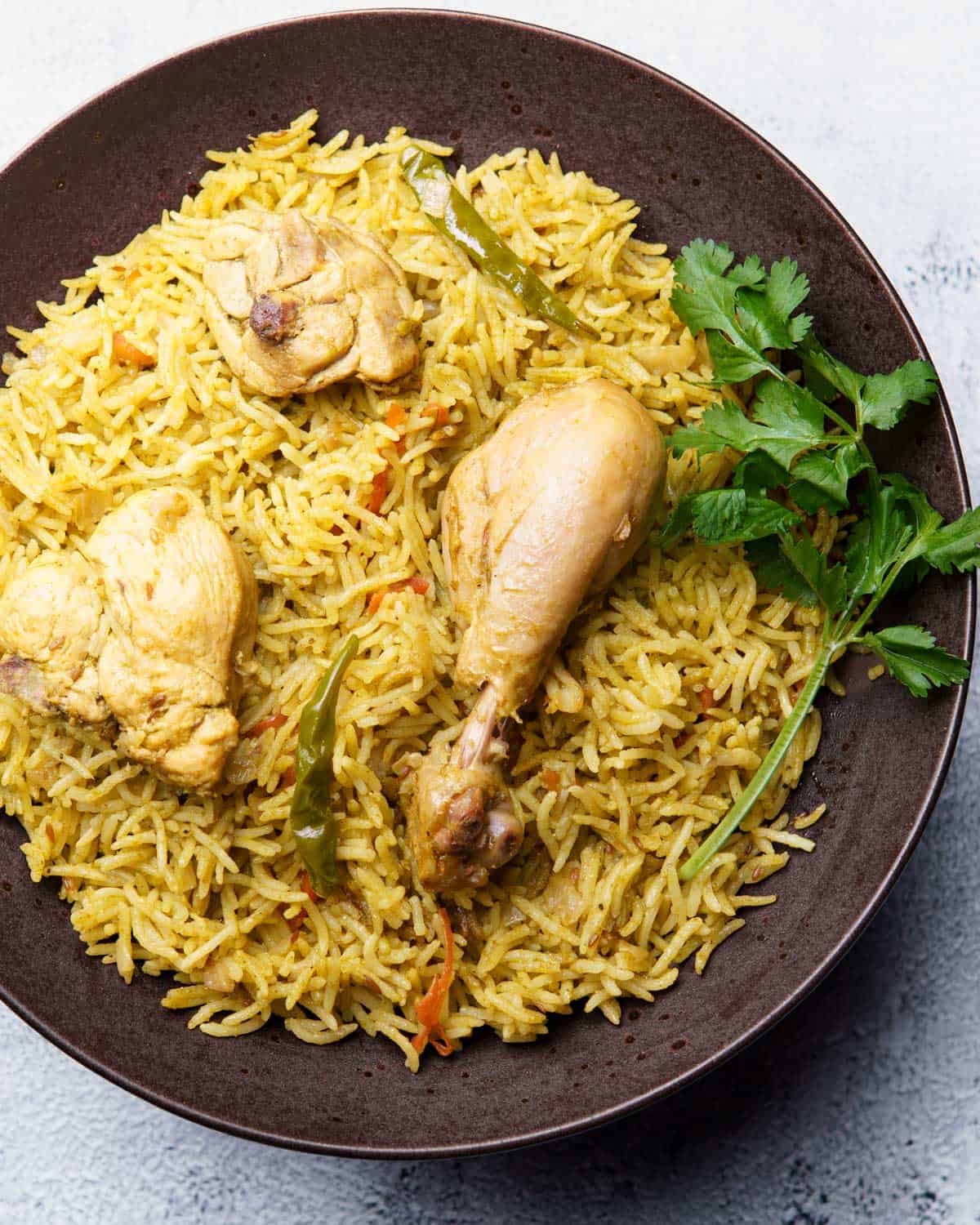 hariyali chicken pulao served on a plate