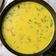 urad dal served in a black bowl